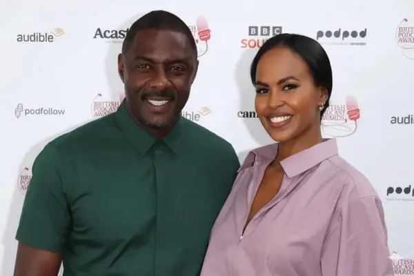 Sonya Nicole Hamlin standing confidently, smiling in professional attire