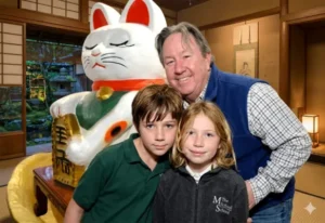 Mark Fluent with his children in a family photo, showing a private and close family moment together