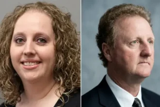 “Corrie Bird, only biological daughter of NBA legend Larry Bird, smiling at family event in Indiana”