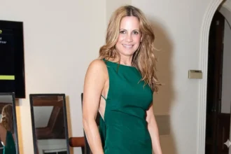 Catherine Mooty smiling in a casual outdoor setting